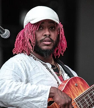 Thundercat (musician) height profile photo