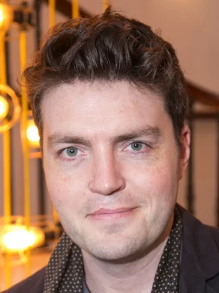 Tom Burke (actor) height profile photo