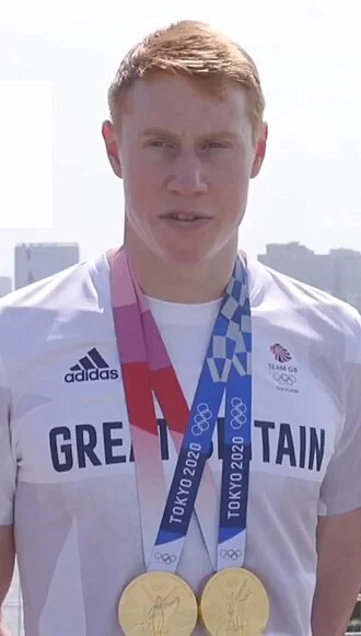 Tom Dean (swimmer) height profile photo