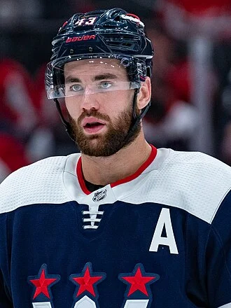 Tom Wilson (ice hockey) height profile photo
