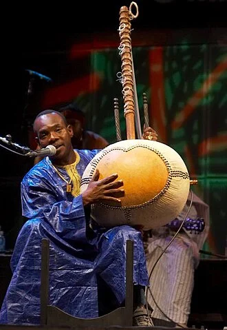 Toumani Diabaté height profile photo