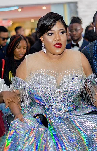 Toyin Abraham height profile photo