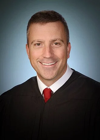 Trevor N. McFadden height profile photo
