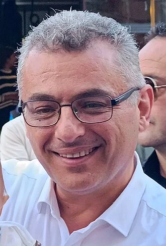 Tufan Erhürman height profile photo