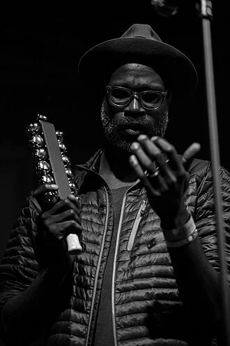 Tunde Adebimpe height profile photo