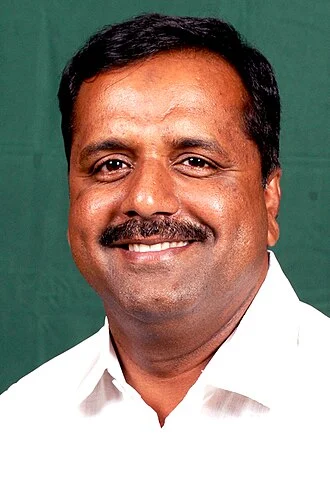U. T. Khader height profile photo