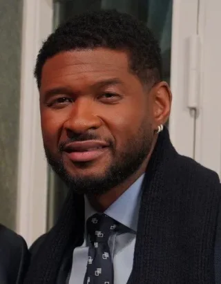 Usher (musician) height profile photo