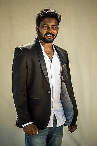 V R Dinesh height profile photo