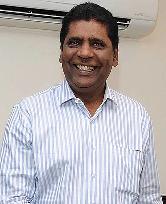 Vijay Amritraj height profile photo