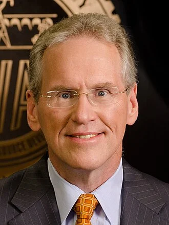 William D. Johnson (CEO) height profile photo
