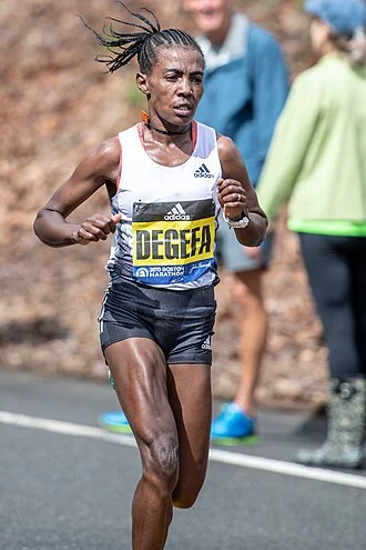 Worknesh Degefa height profile photo