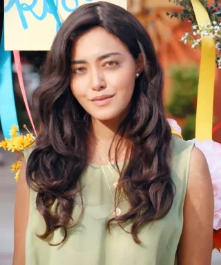 Yasmine Al-Bustami height profile photo